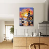 petit voilier et phare au coucher de soleil